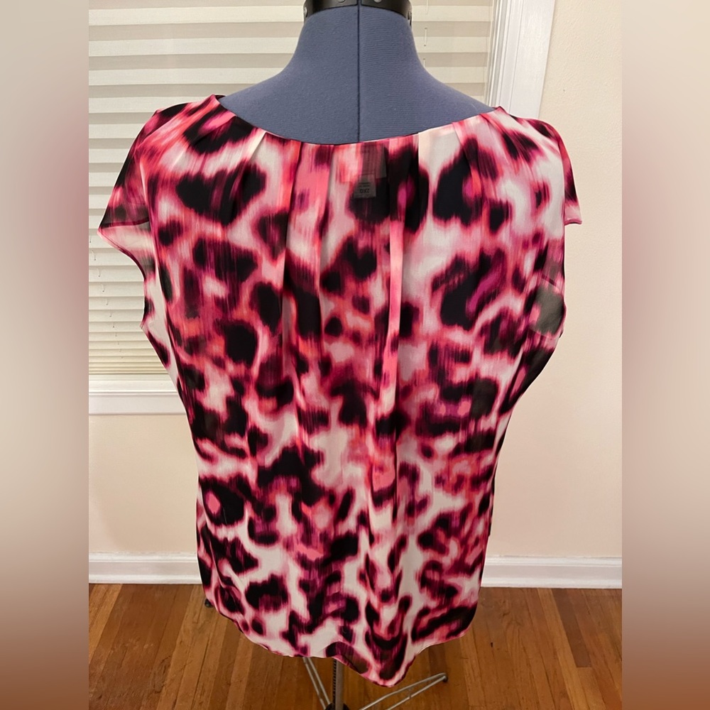 Hot pink and black semi sheer top.